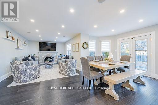 14 Balsdon Crescent, Whitby (Lynde Creek), ON - Indoor Photo Showing Dining Room With Fireplace
