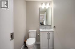 Half bath with vanity and toilet -