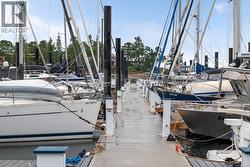 Dock area featuring a water view -