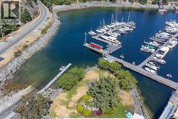 Aerial overview of property's location featuring a nearby body of water -
