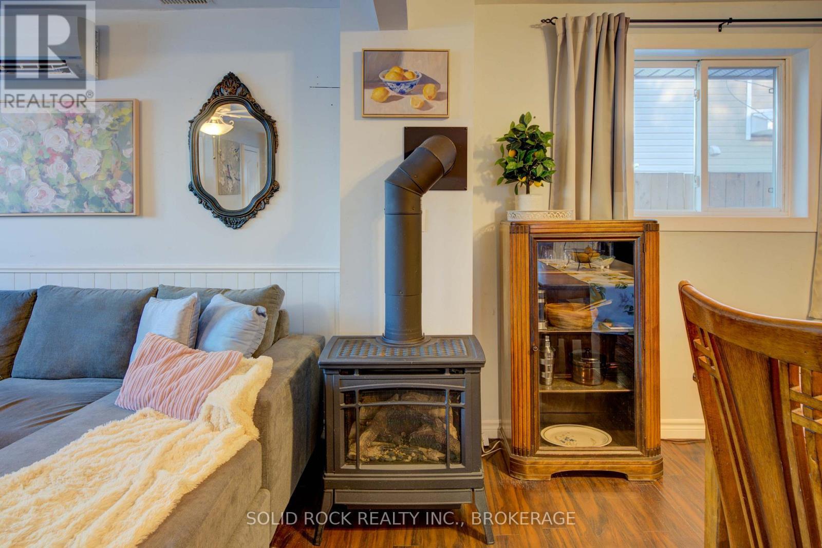 20 Maccauley Street, Kingston (Rideau), ON - Indoor With Fireplace