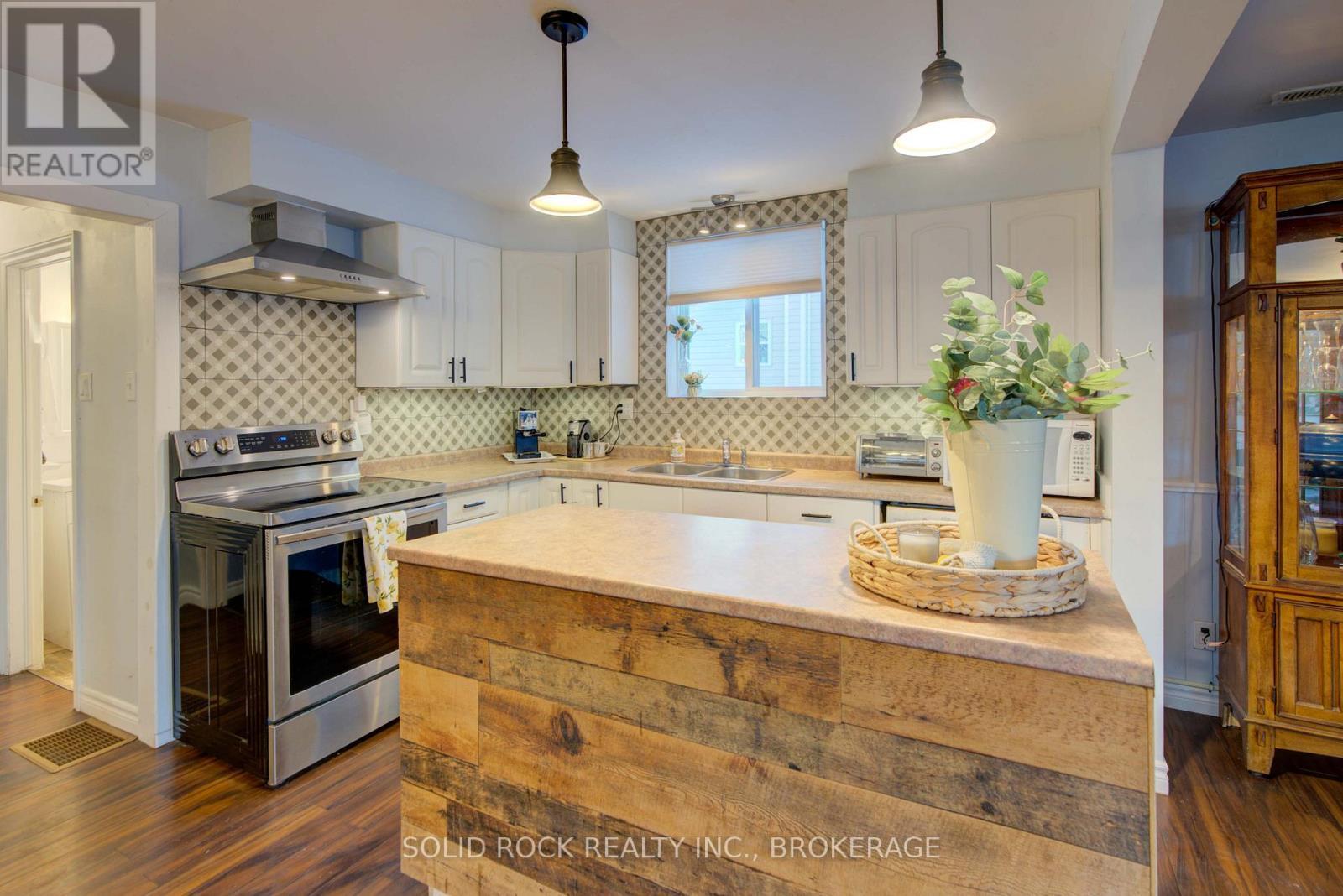 20 Maccauley Street, Kingston (Rideau), ON - Indoor Photo Showing Kitchen With Double Sink