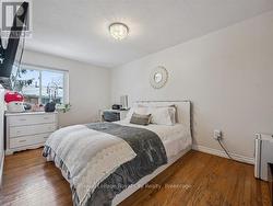 14'8 \" x 9' 1 hardwood floor and a double closet -