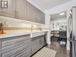 Focal point is the farmhouse double sink. -