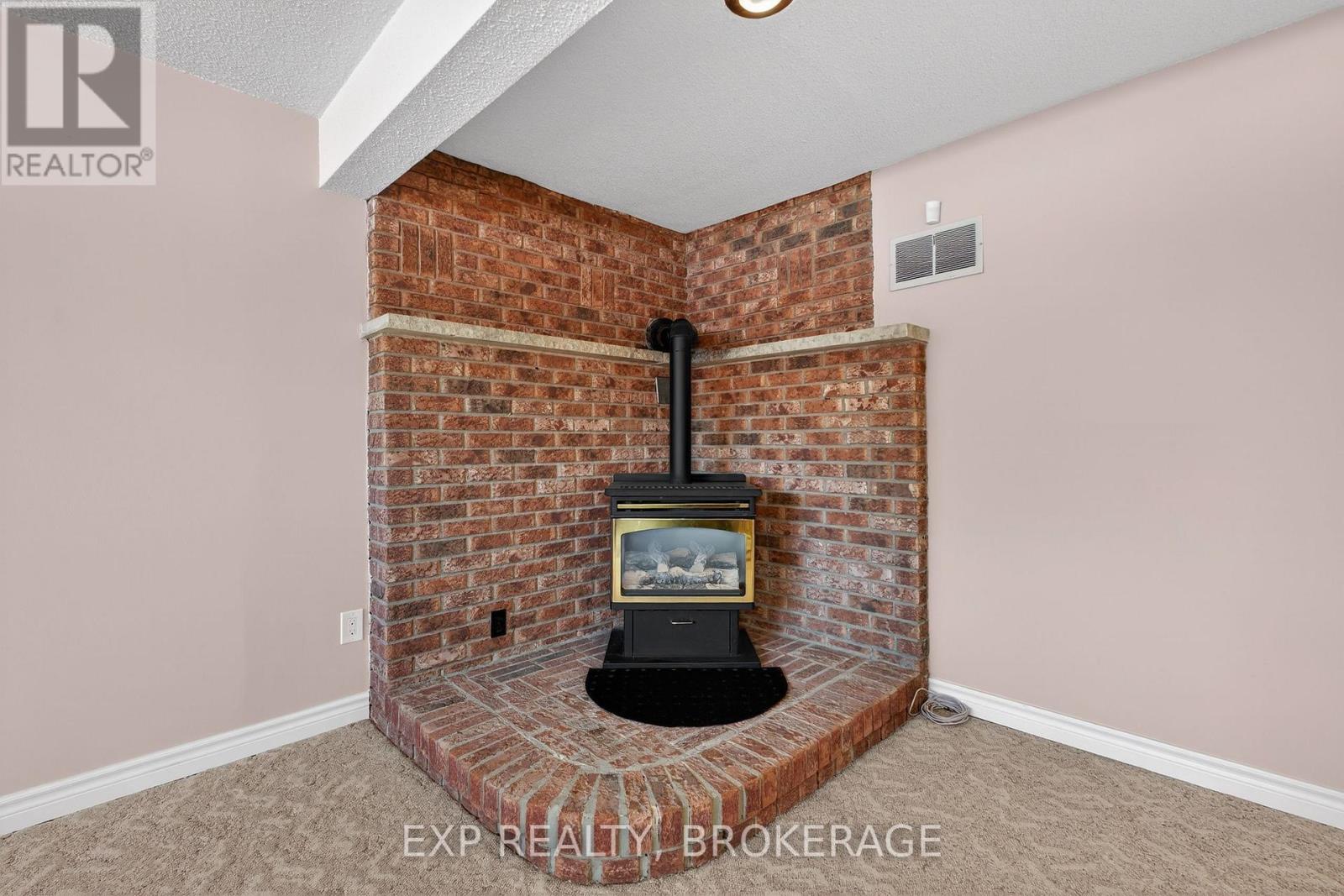 1048 Bauder Crescent, Kingston (North Of Taylor-Kidd Blvd), ON - Indoor Photo Showing Other Room With Fireplace