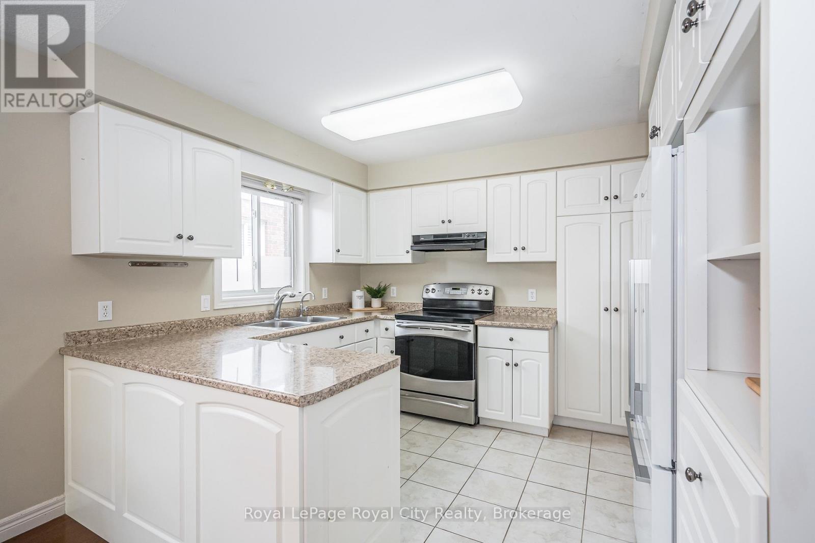 24 Beechlawn Boulevard, Guelph (Village By The Arboretum), ON - Indoor Photo Showing Kitchen With Double Sink