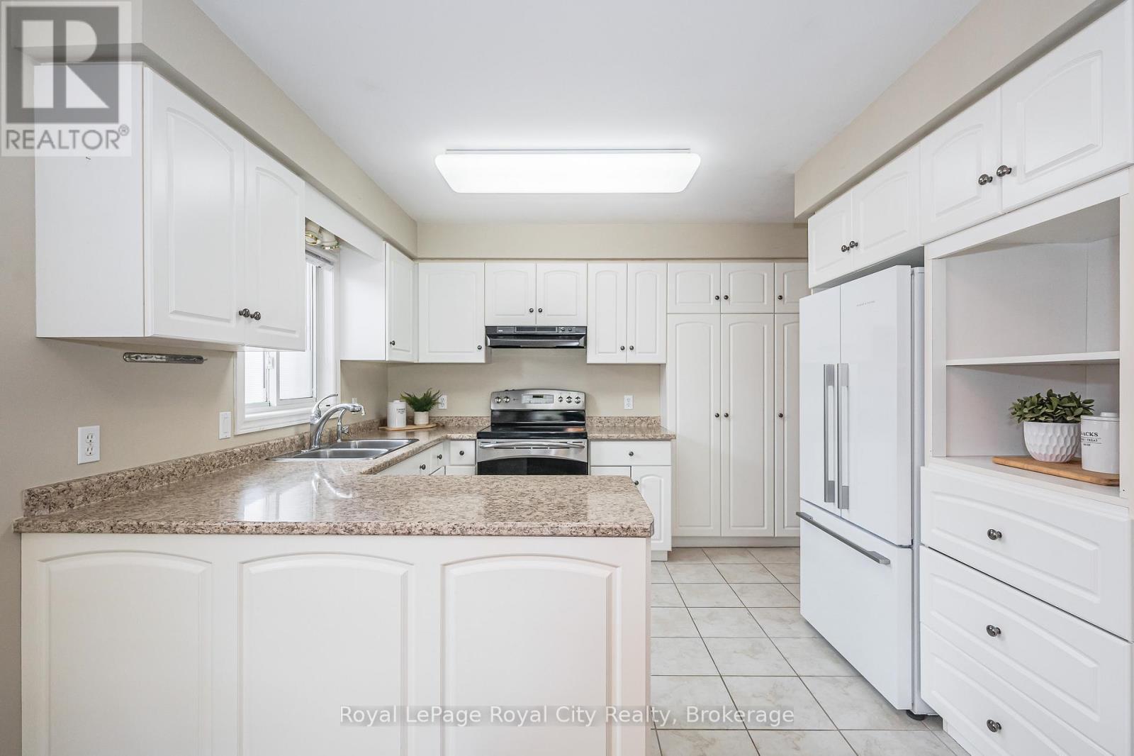 24 Beechlawn Boulevard, Guelph (Village By The Arboretum), ON - Indoor Photo Showing Kitchen With Double Sink