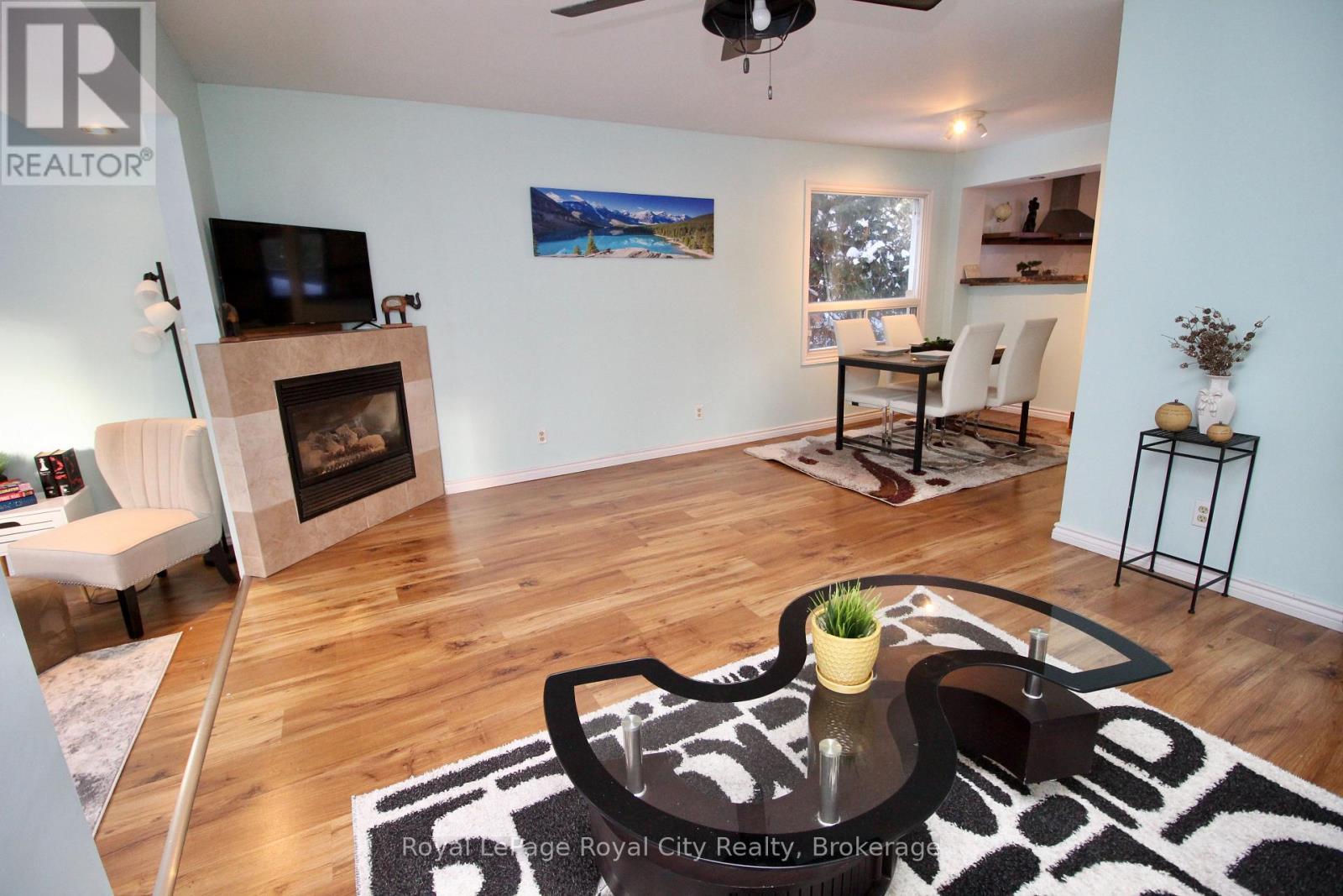 28 Harpur Drive, Northern Bruce Peninsula, ON - Indoor Photo Showing Living Room With Fireplace