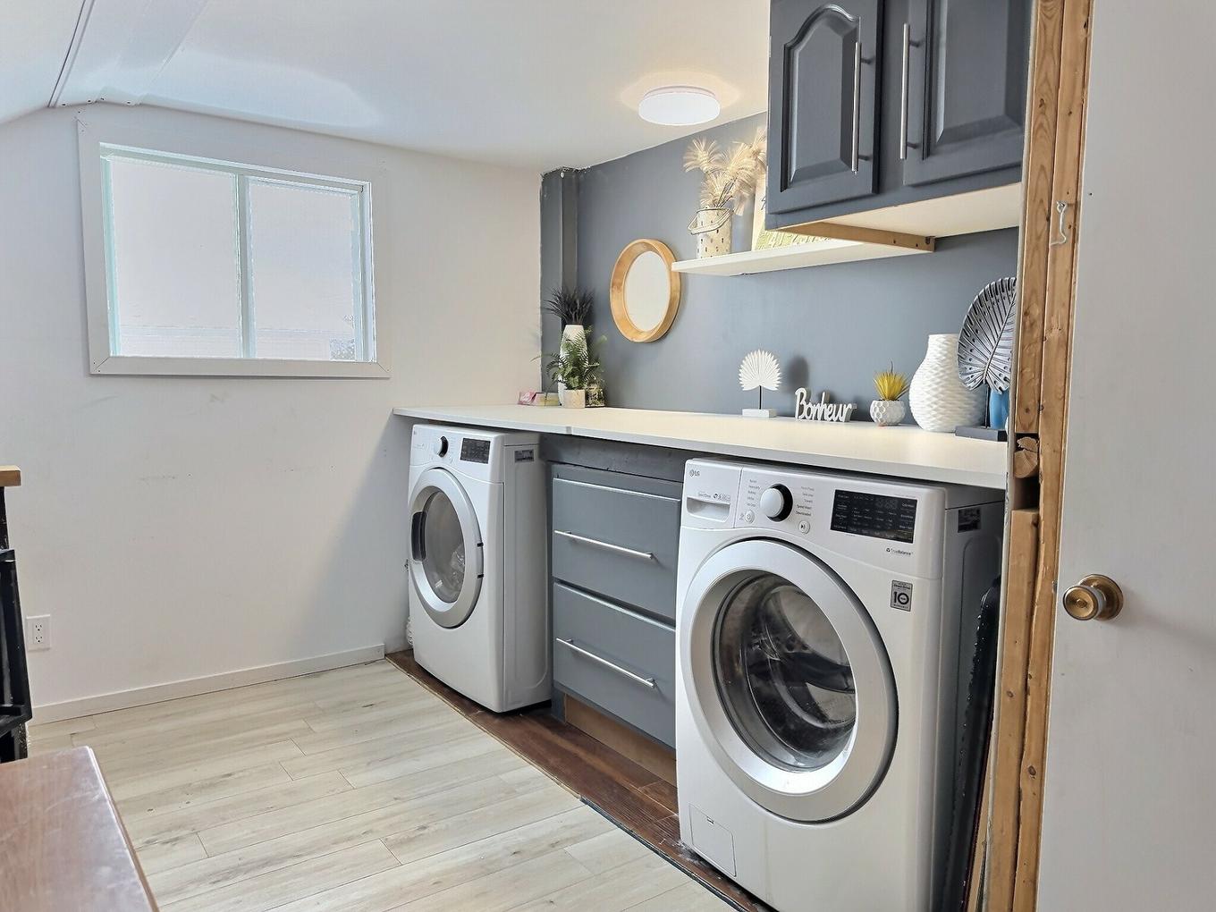 Salle de lavage - 23 Rue Principale S., Béarn, QC - Indoor Photo Showing Laundry Room