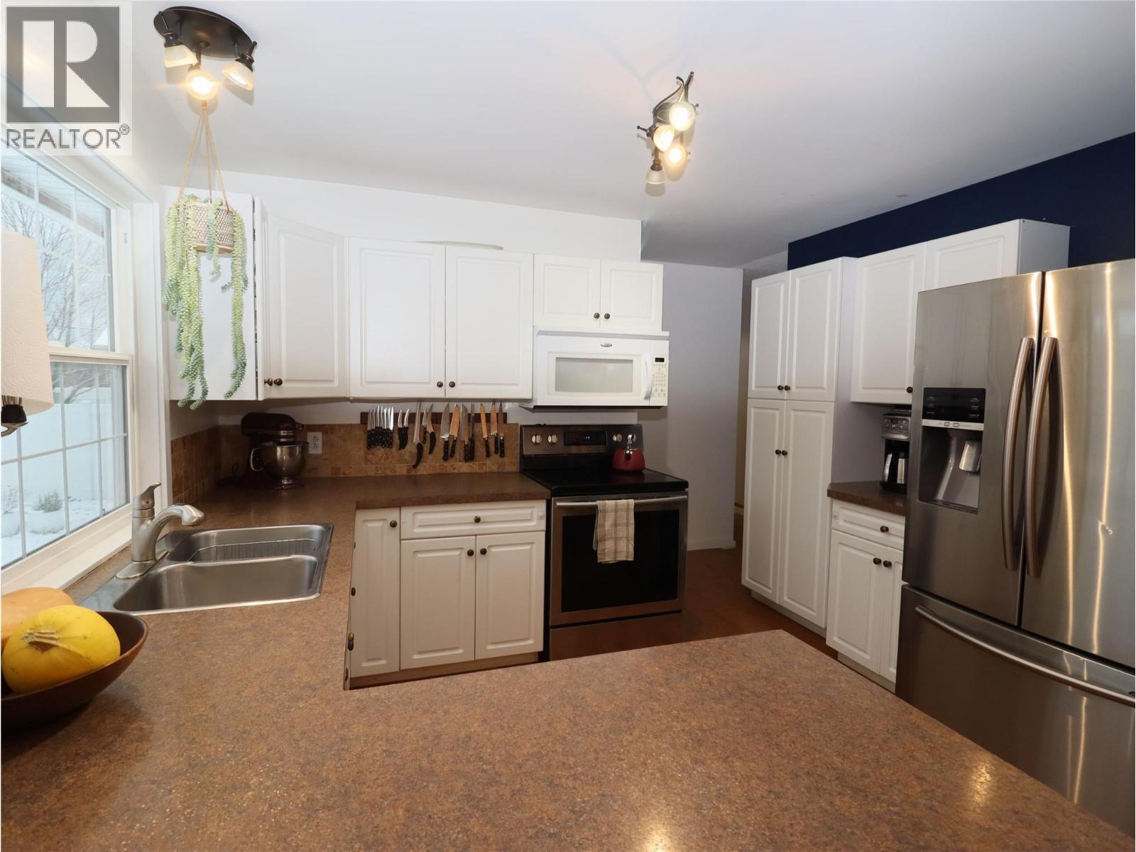 7665 Boundary Drive, Grand Forks, BC - Indoor Photo Showing Kitchen With Double Sink