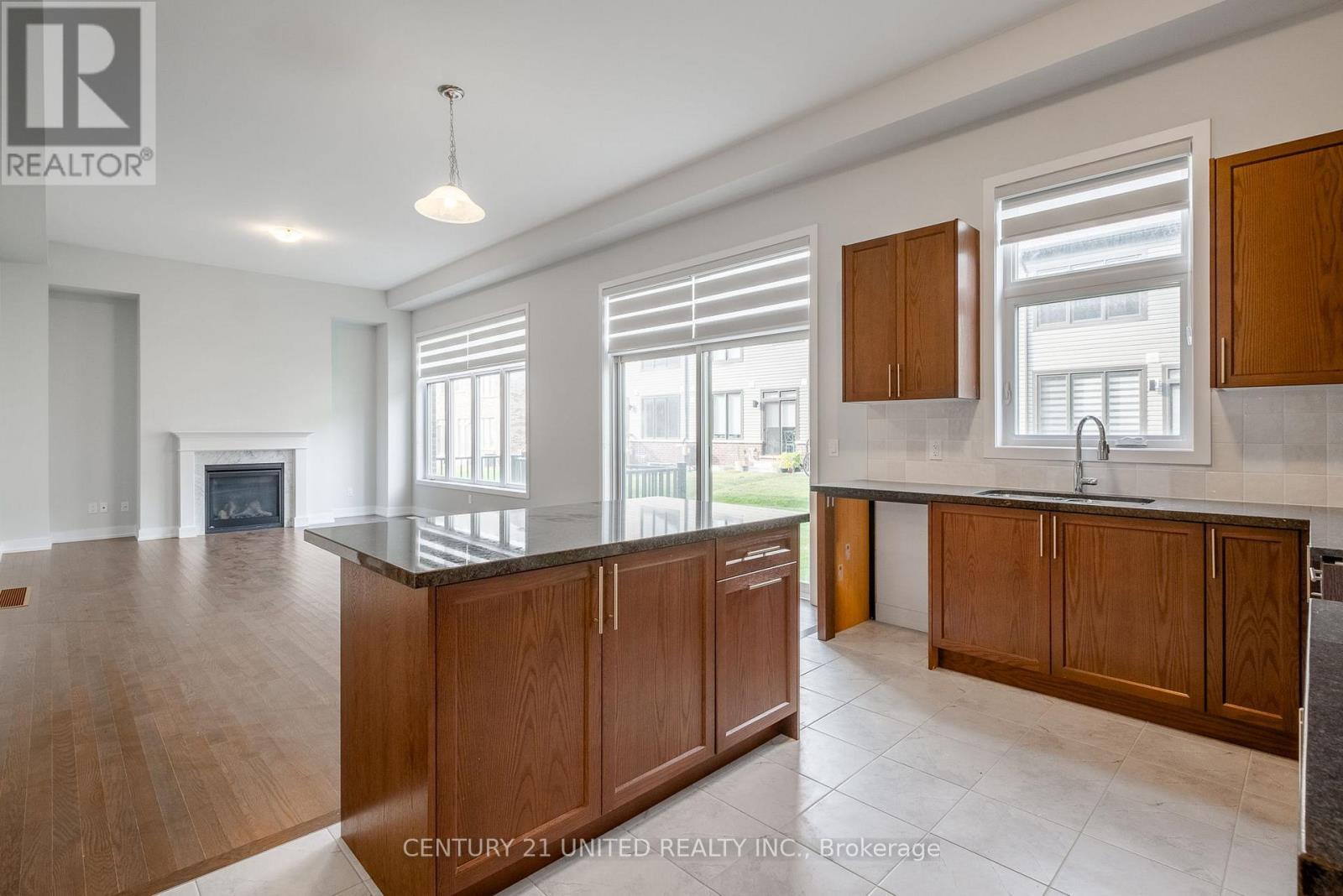1040 Unit A Suddard Avenue, Oshawa (Kedron), ON - Indoor Photo Showing Kitchen With Fireplace