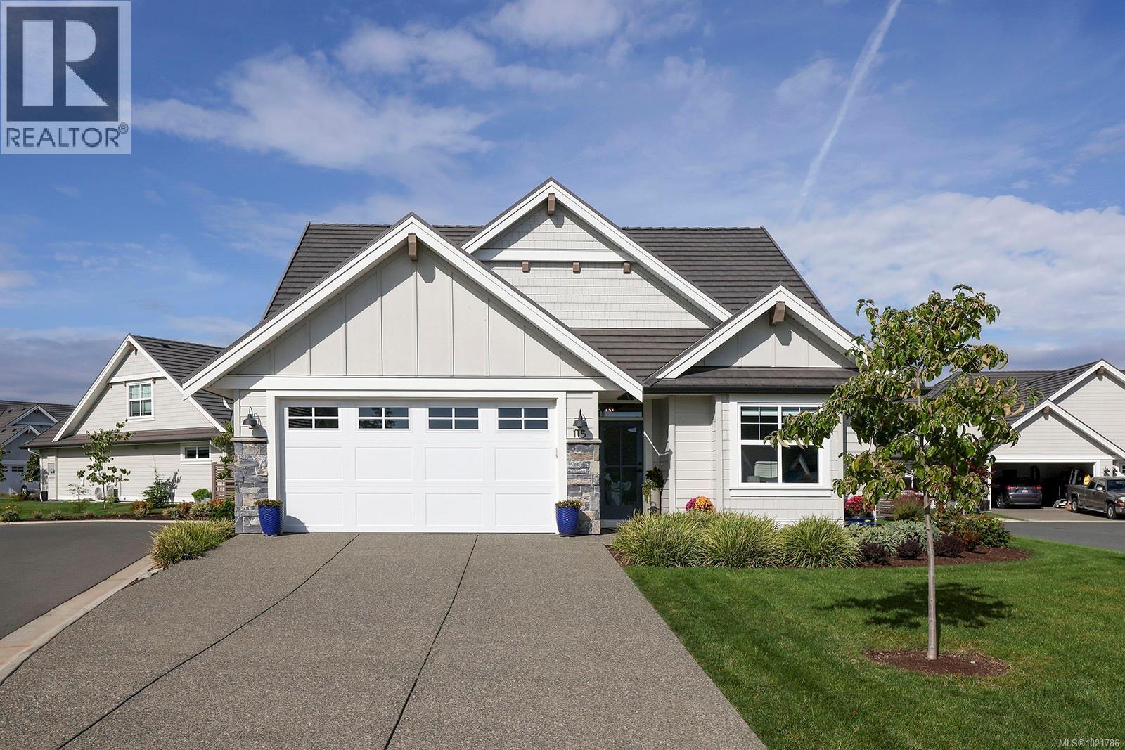 115 1444 Crown Isle Dr, Courtenay, BC - Outdoor With Facade