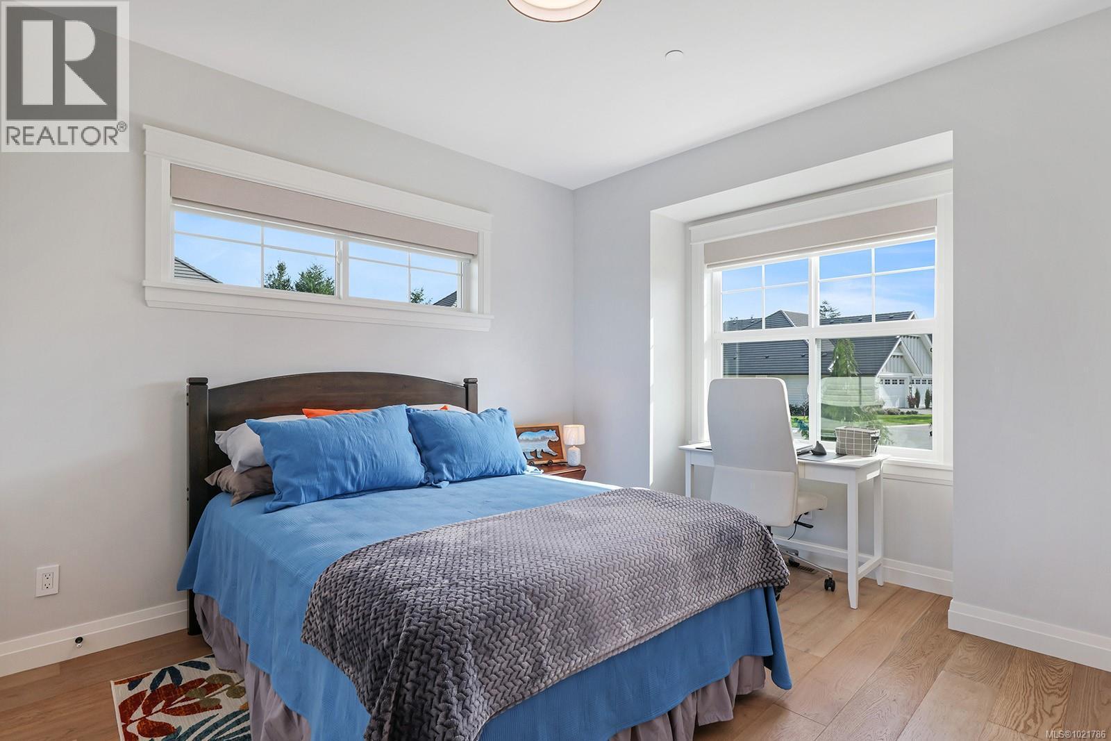 115 1444 Crown Isle Dr, Courtenay, BC - Indoor Photo Showing Bedroom