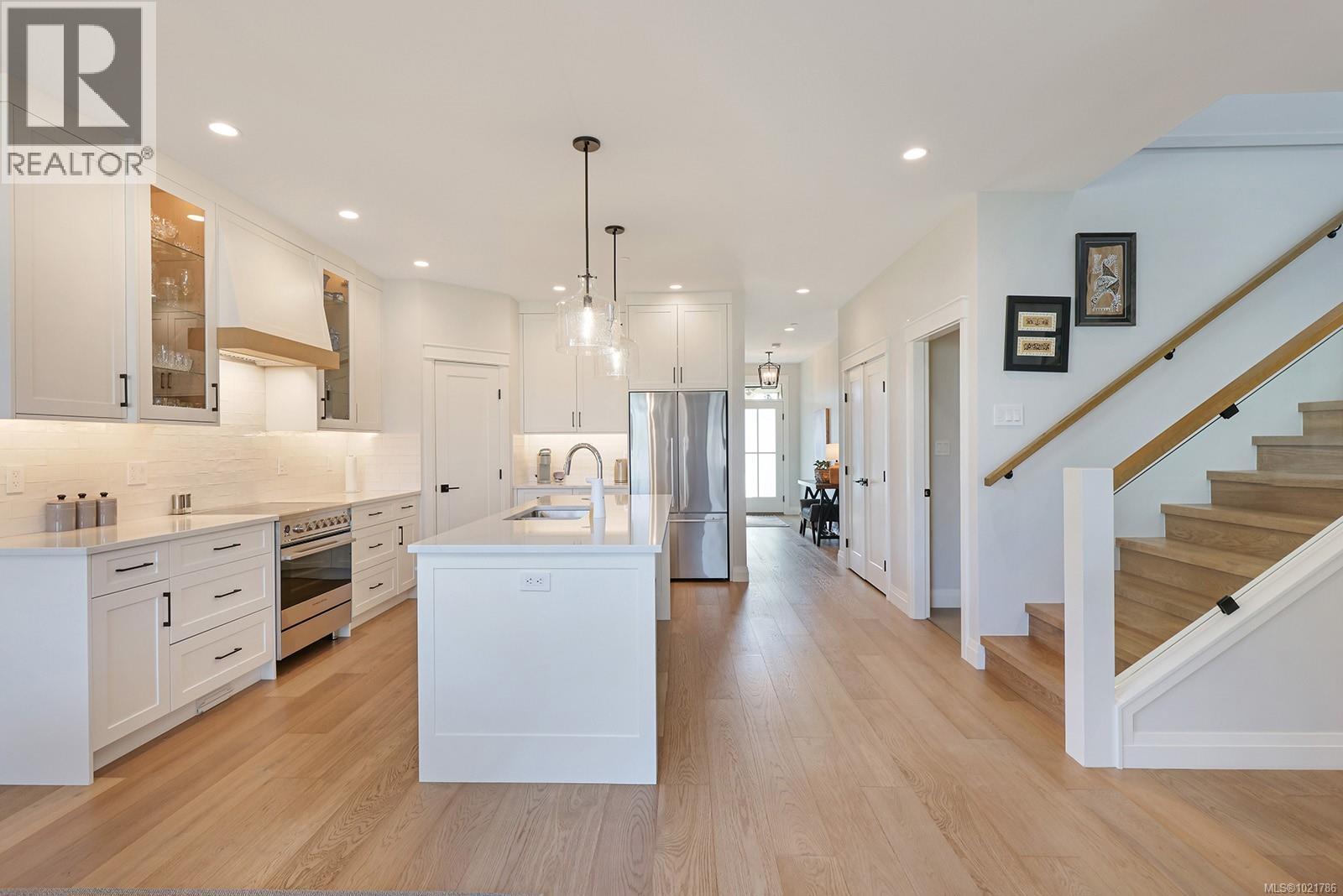 115 1444 Crown Isle Dr, Courtenay, BC - Indoor Photo Showing Kitchen With Upgraded Kitchen