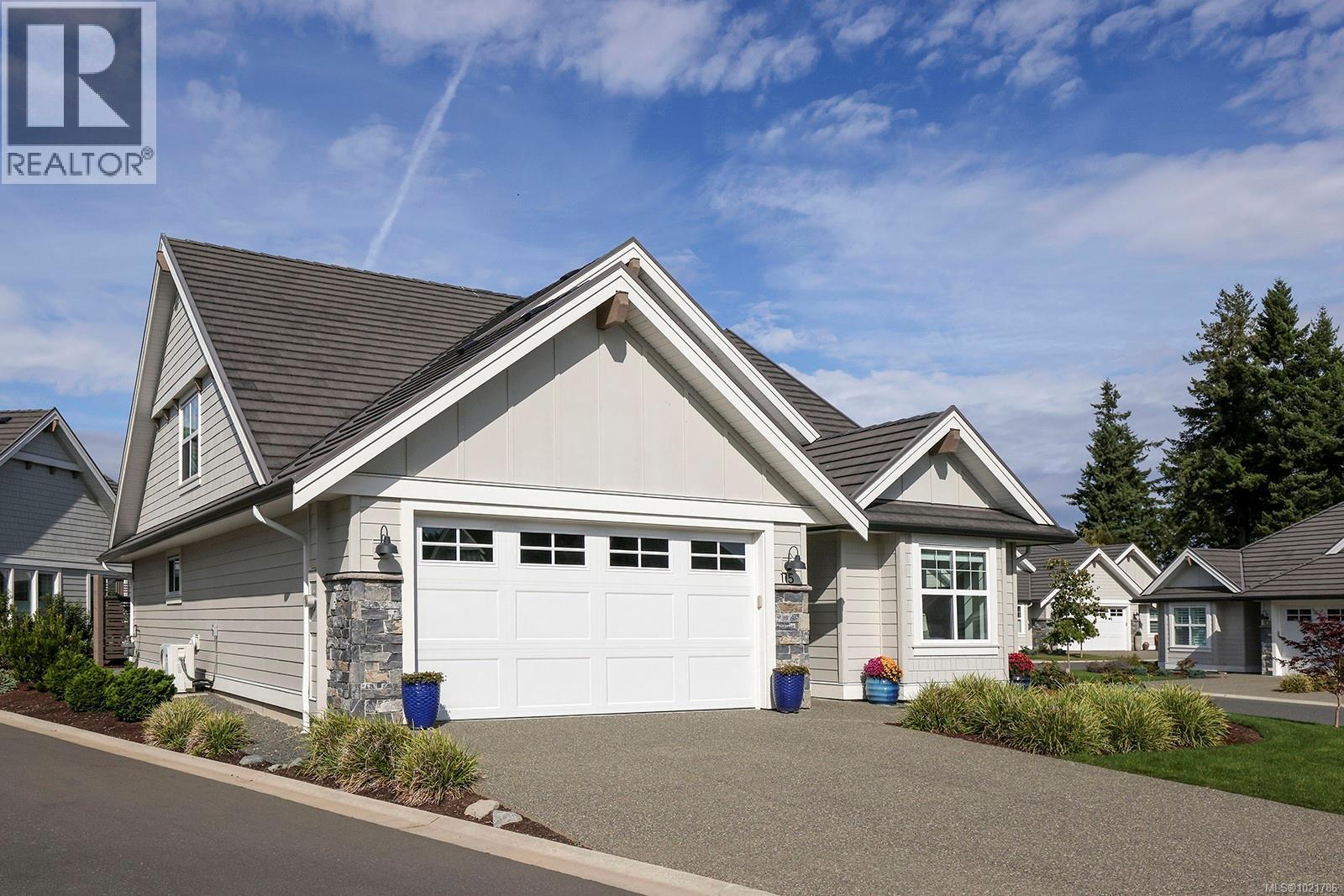 115 1444 Crown Isle Dr, Courtenay, BC - Outdoor With Facade