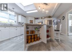 3 Extra cabinets along the back of the island -