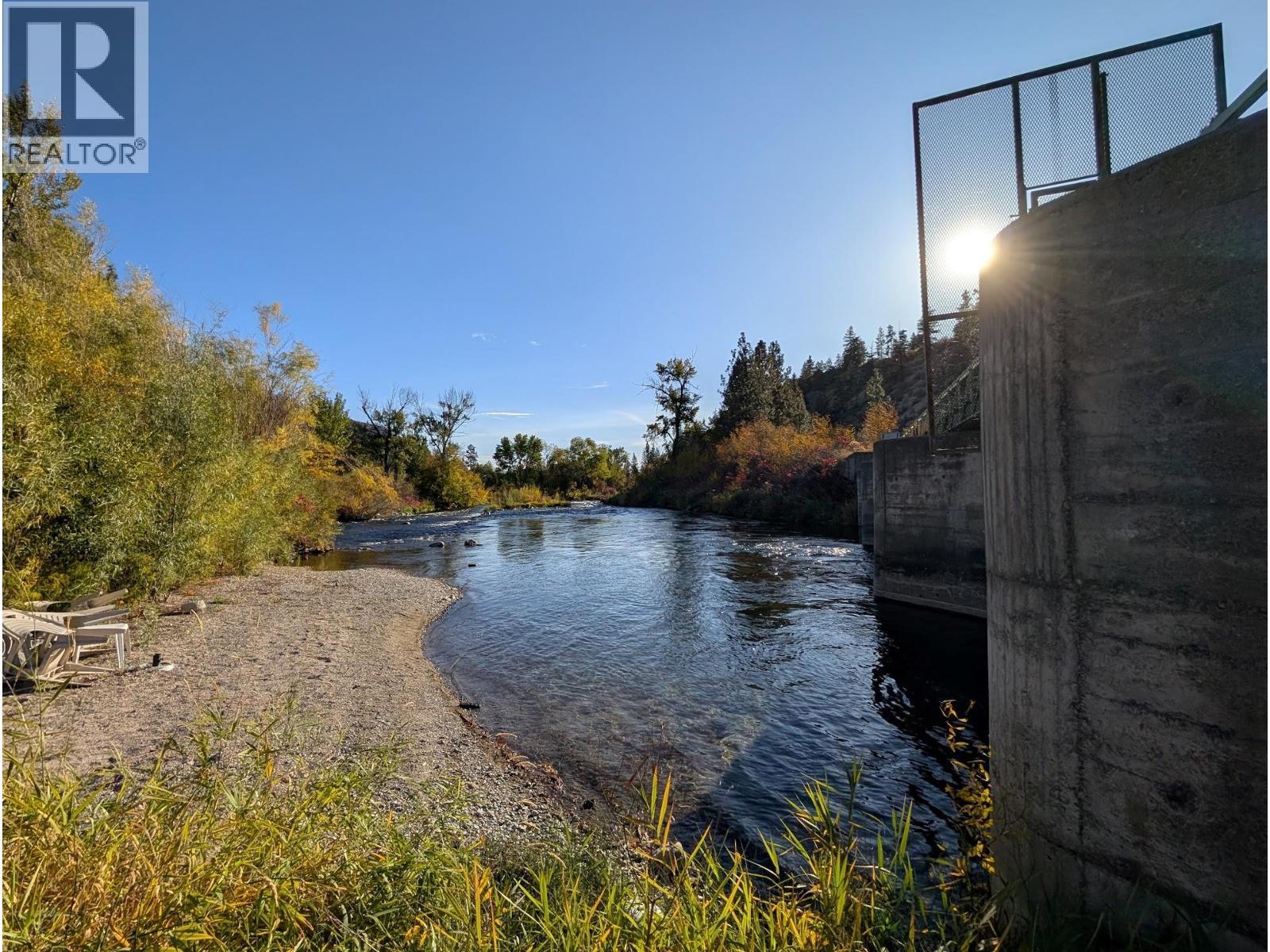 Steps from your front door is a private sandy beach - 8598 Hwy 97 Unit# 50, Oliver, BC