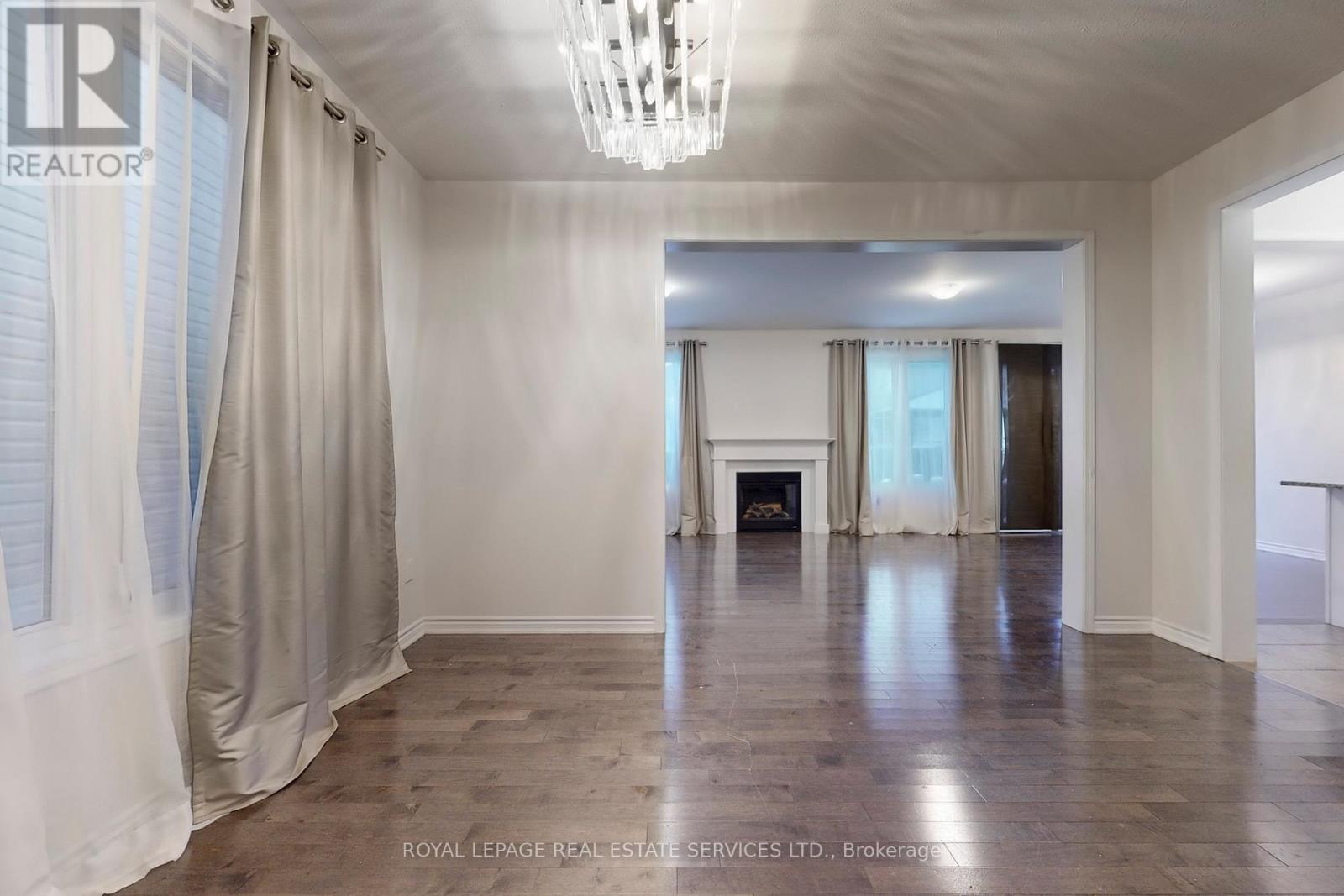 389 Gosford Crescent, Milton, ON - Indoor Photo Showing Other Room With Fireplace