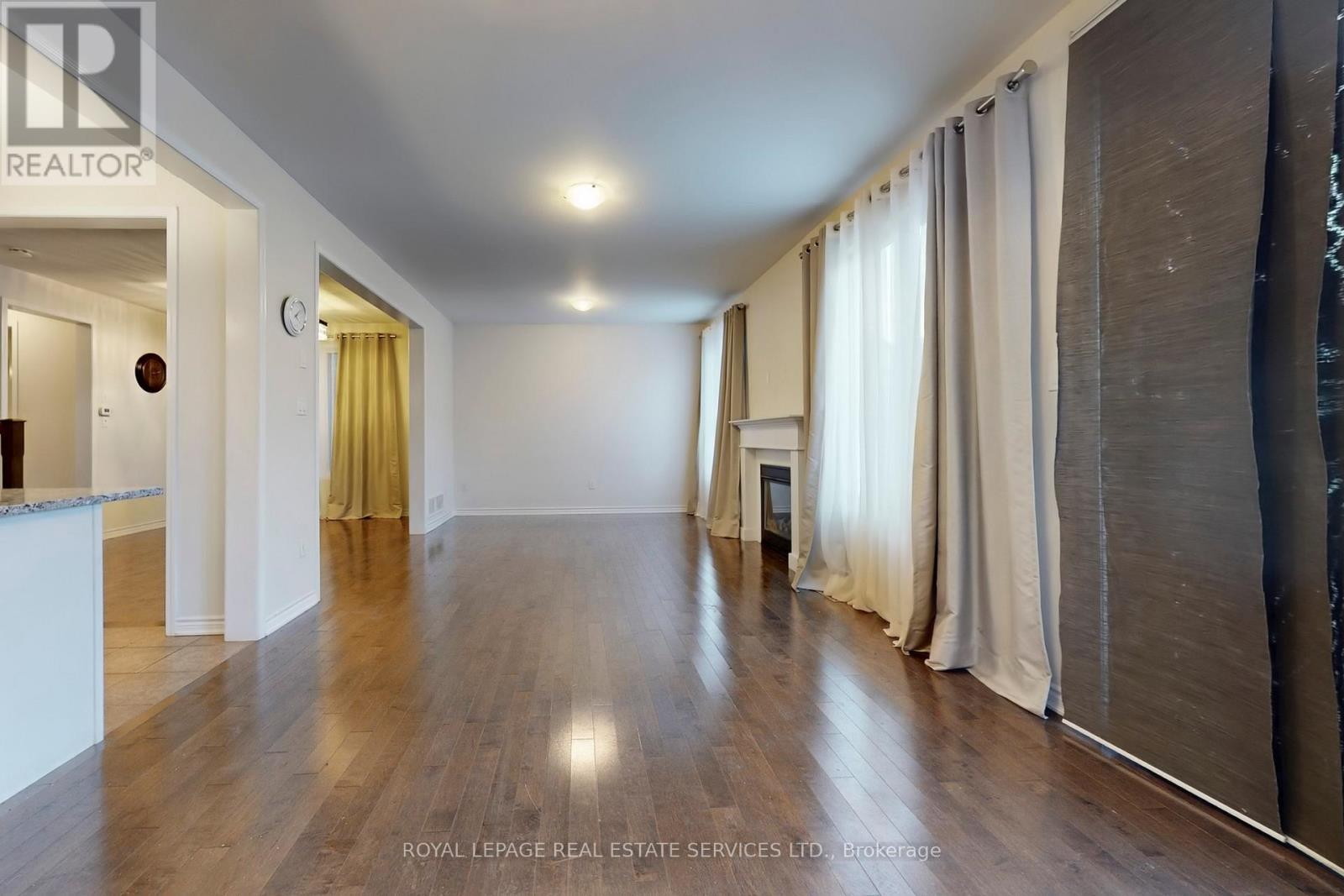 389 Gosford Crescent, Milton, ON - Indoor Photo Showing Other Room With Fireplace