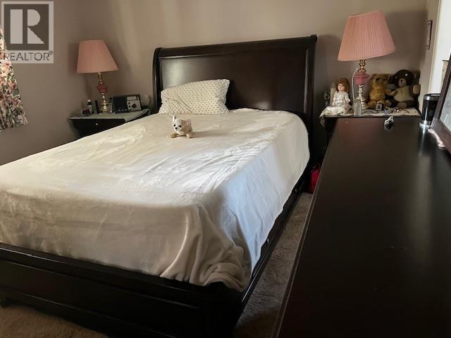 6526 Tucelnuit Drive Unit# 23, Oliver, BC - Indoor Photo Showing Bedroom