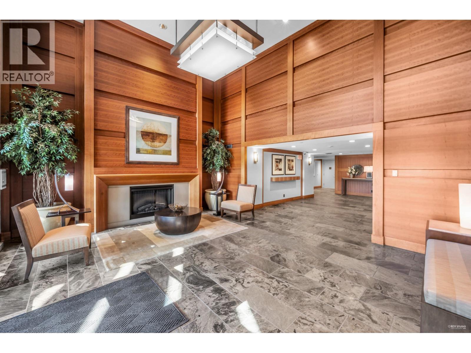 401 3315 Cypress Place, West Vancouver, BC - Indoor With Fireplace