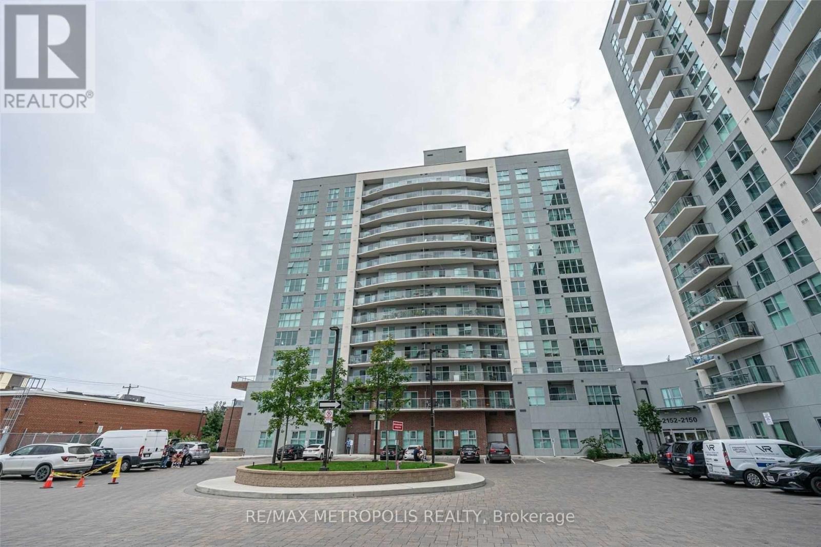 1601 - 2152 Lawrence Avenue E, Toronto, ON - Outdoor With Balcony With Facade