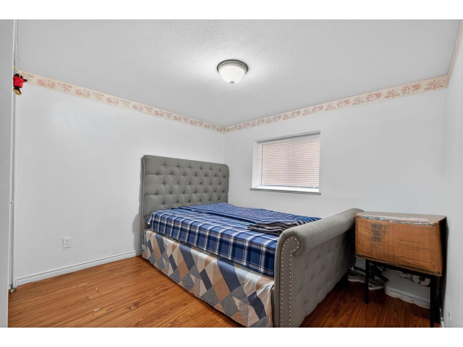 7576 140 Street, Surrey, BC - Indoor Photo Showing Bedroom