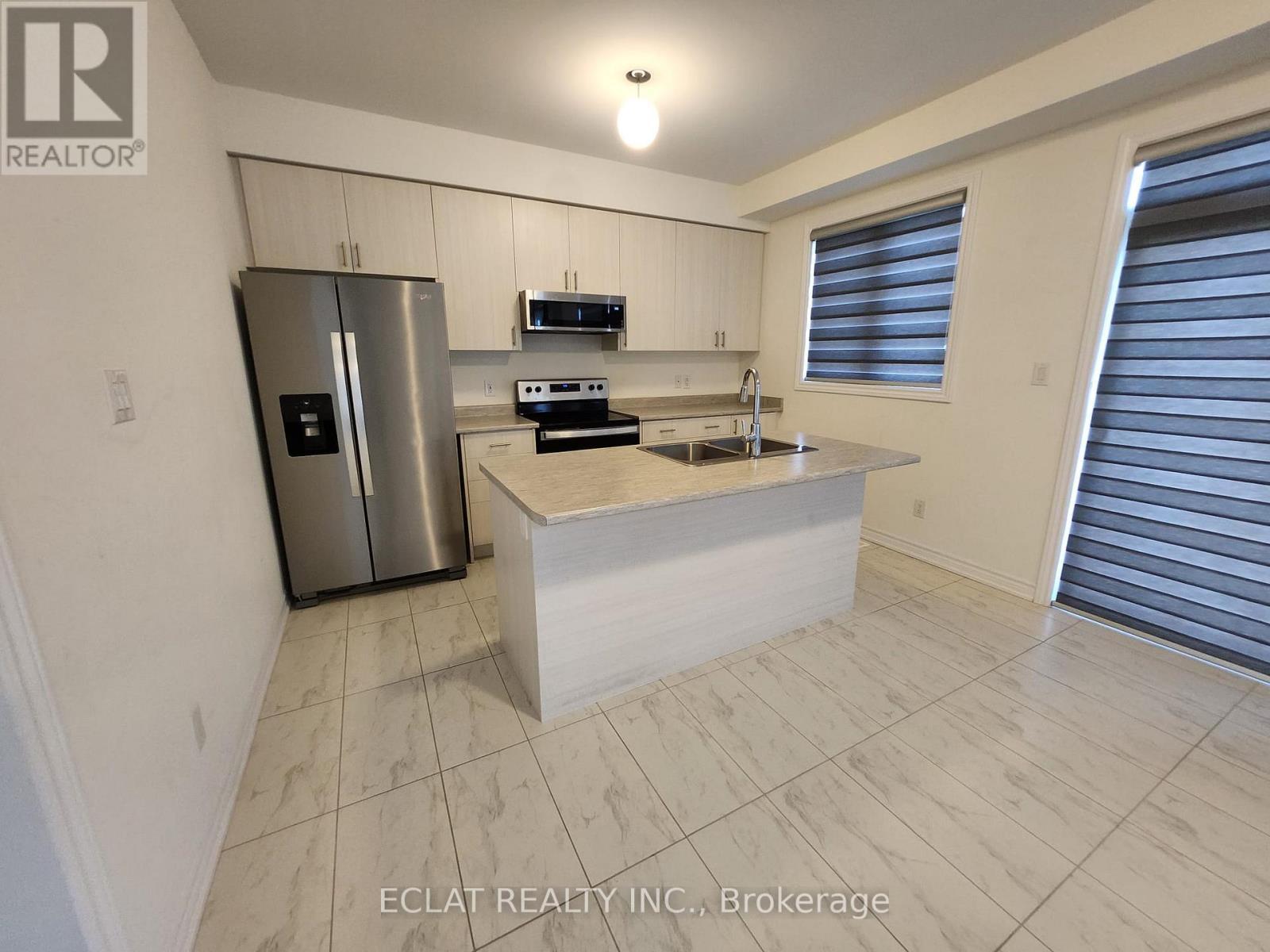 48 Simona Avenue, Wasaga Beach, ON - Indoor Photo Showing Kitchen With Stainless Steel Kitchen With Double Sink