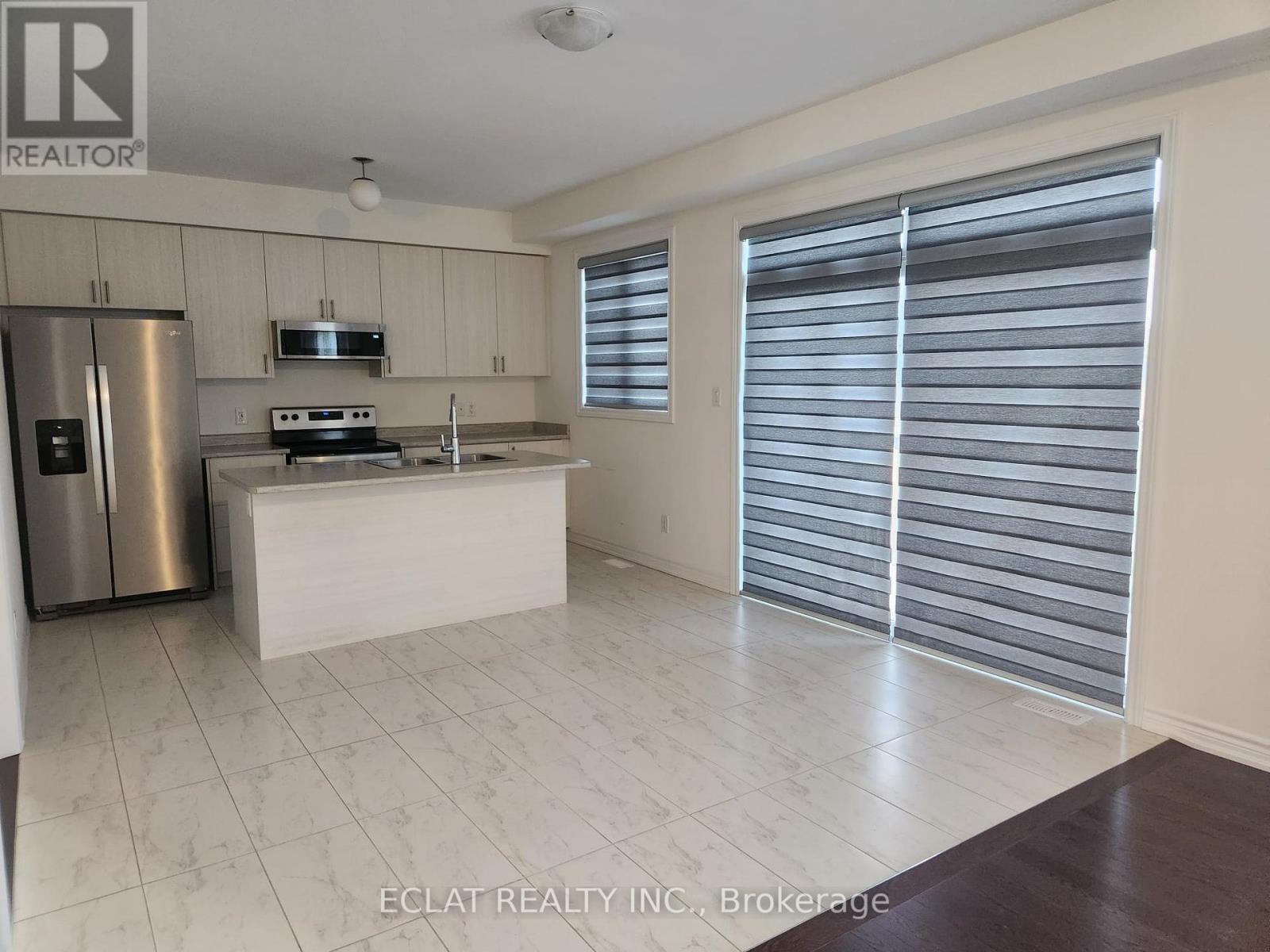 48 Simona Avenue, Wasaga Beach, ON - Indoor Photo Showing Kitchen With Stainless Steel Kitchen With Double Sink
