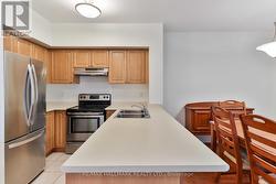 Kitchen with breakfast bar & built in dishwasher -