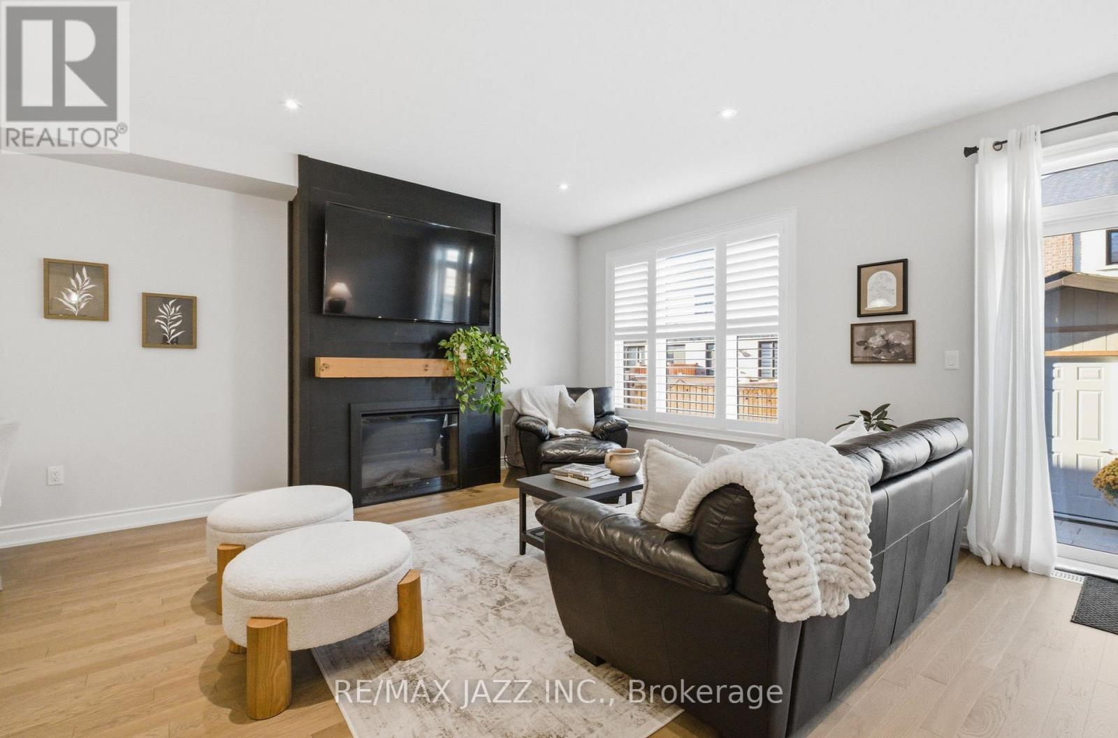 127 Laing Drive, Whitby, ON - Indoor Photo Showing Living Room With Fireplace