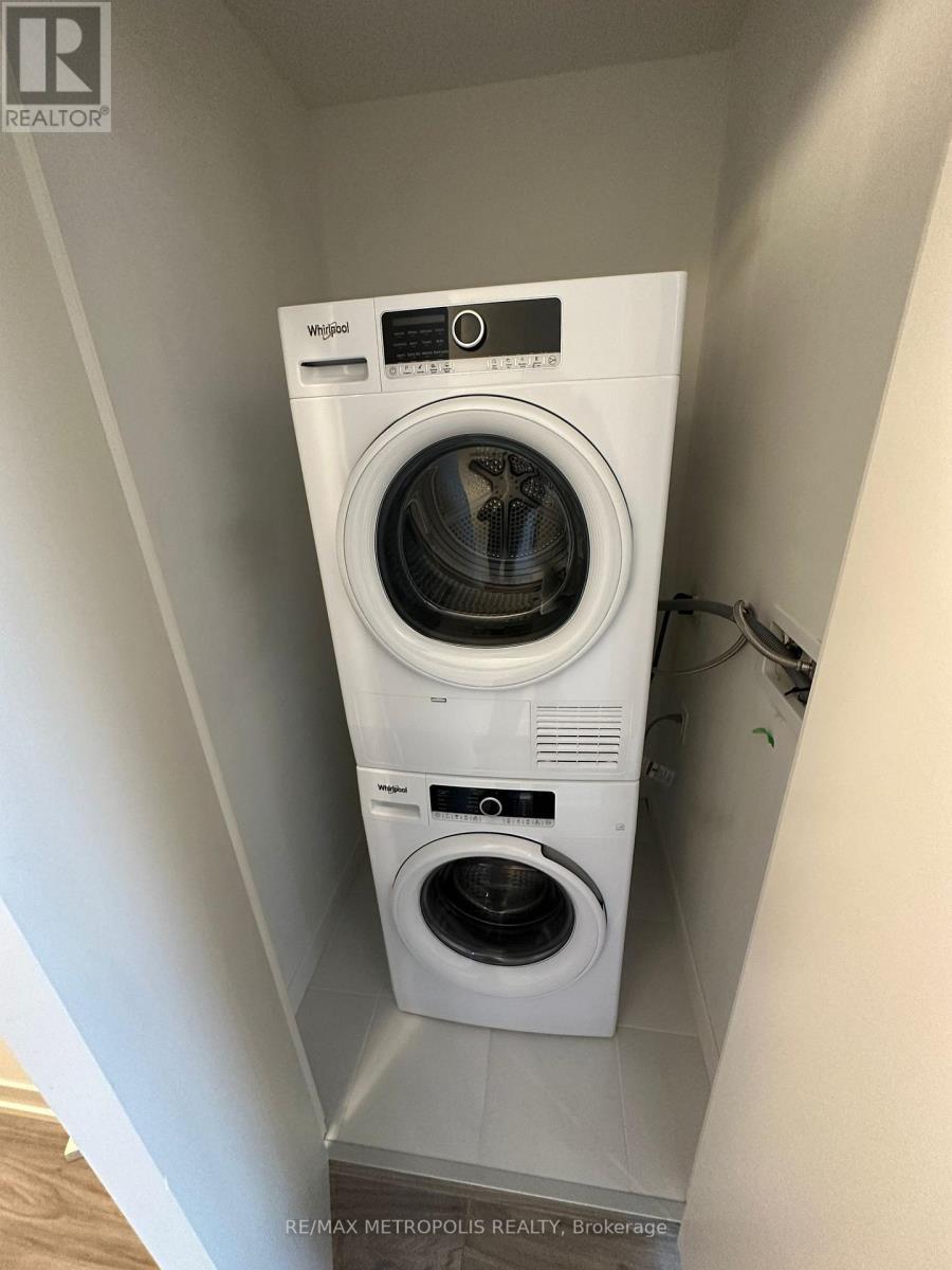 103 - 2209 Kingston Road, Toronto, ON - Indoor Photo Showing Laundry Room