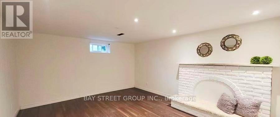 Lower - 53 Marblemount Crescent, Toronto, ON - Indoor With Fireplace