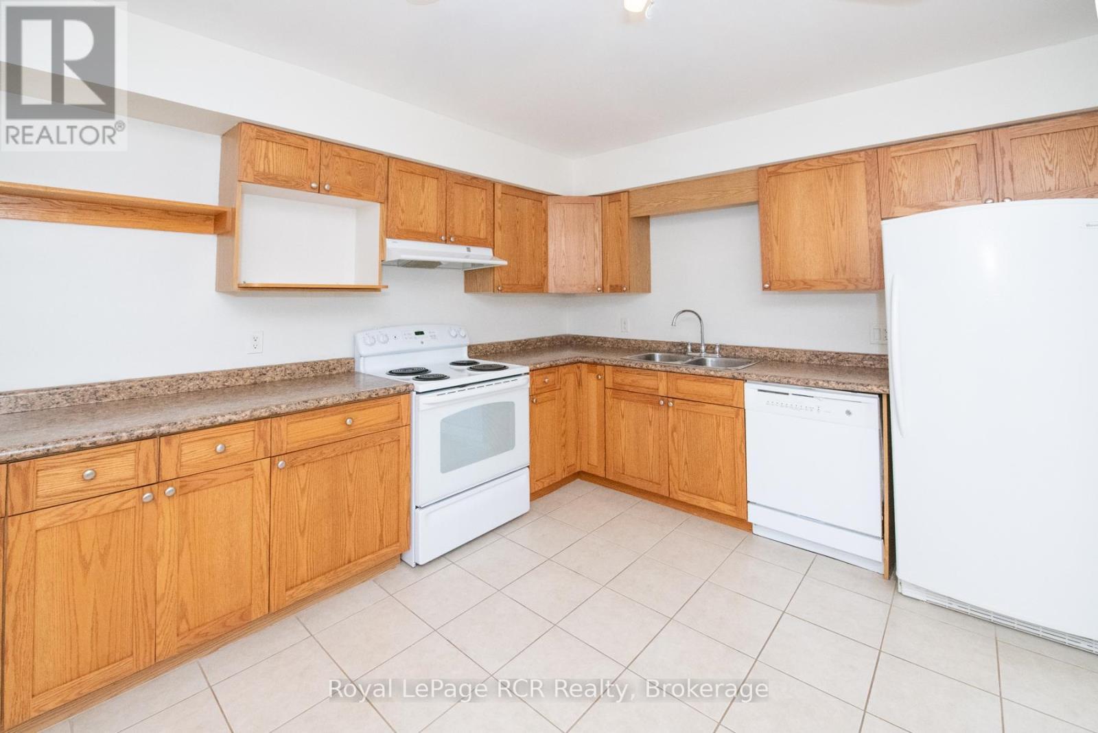 306 - 497 Birmingham St West Street W, Wellington North (Mount Forest), ON - Indoor Photo Showing Kitchen With Double Sink