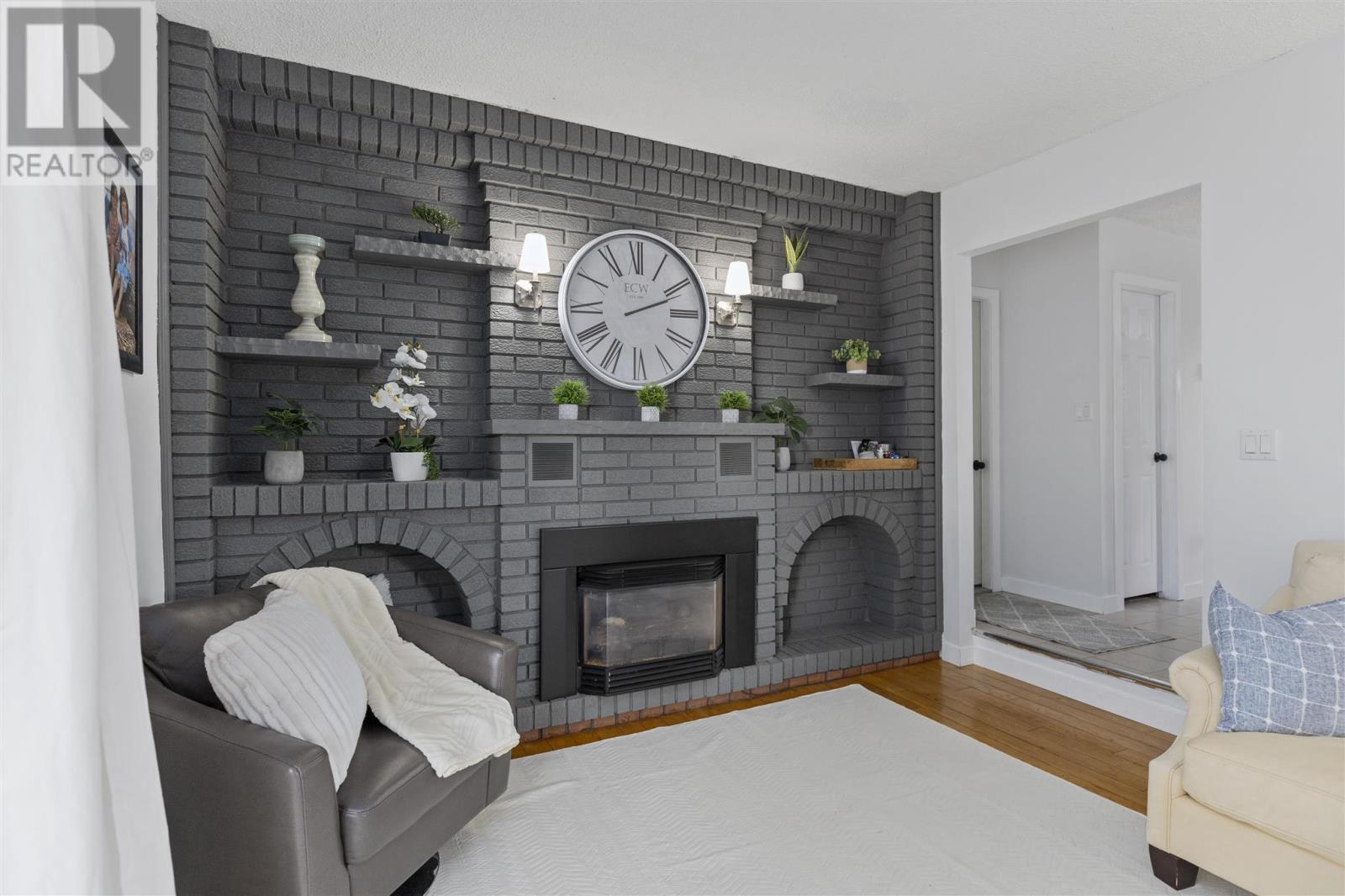 3 Charlotte Dr, Sault Ste. Marie, ON - Indoor Photo Showing Living Room With Fireplace