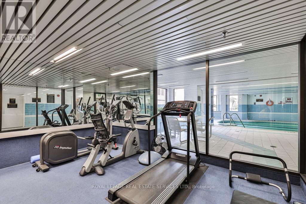 708 - 100 Lakeshore Road E, Oakville, ON - Indoor Photo Showing Gym Room