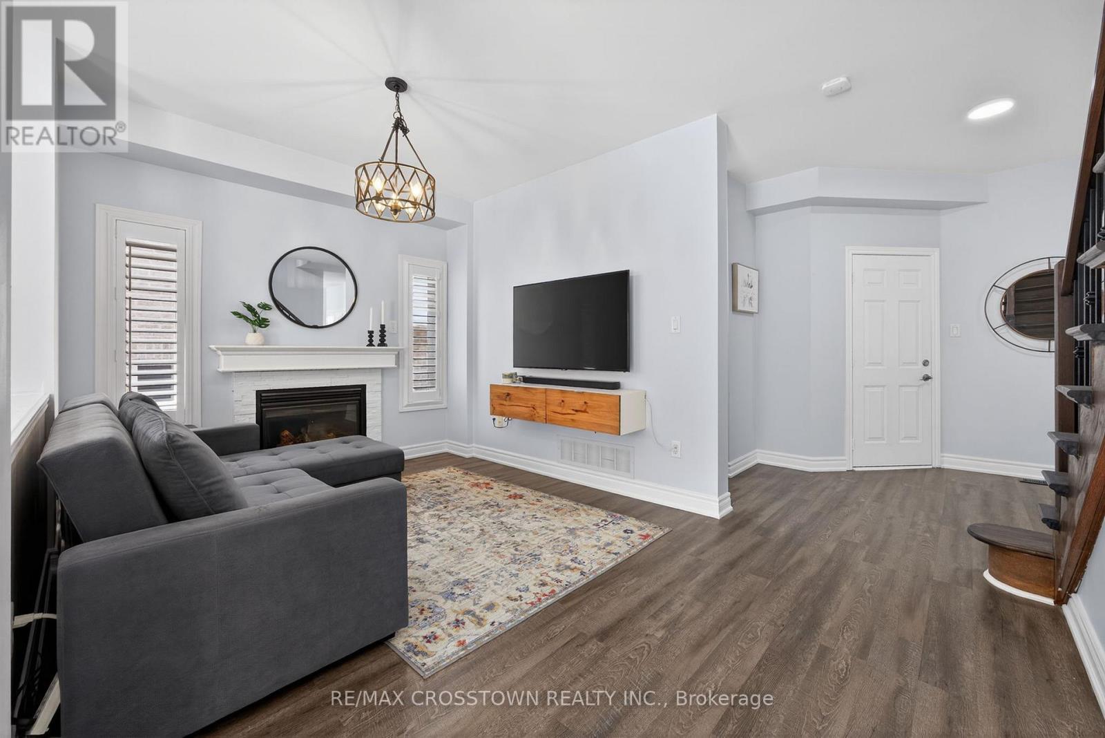 1 Black Ash Trail, Barrie, ON - Indoor Photo Showing Living Room With Fireplace