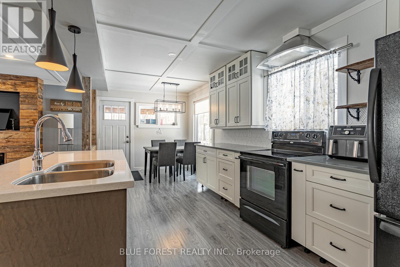 9716 Lakeshore Road, Lambton Shores (Grand Bend), ON - Indoor Photo Showing Kitchen With Double Sink