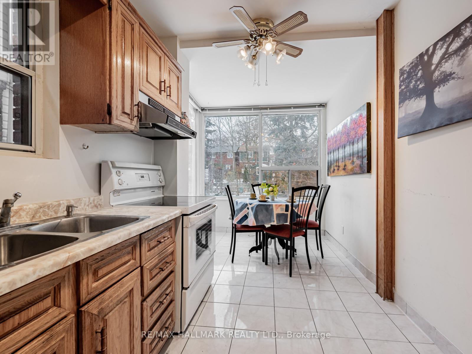 538 Strathmore Boulevard, Toronto, ON - Indoor Photo Showing Kitchen With Double Sink