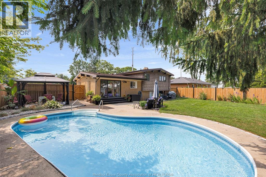 1150 Cabana Road West, Windsor, ON - Outdoor With In Ground Pool With Backyard