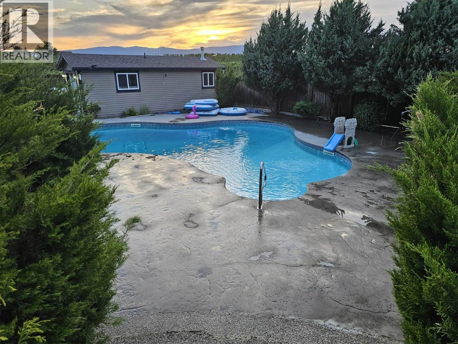 3576 Rose Road, Kelowna, BC - Outdoor With In Ground Pool