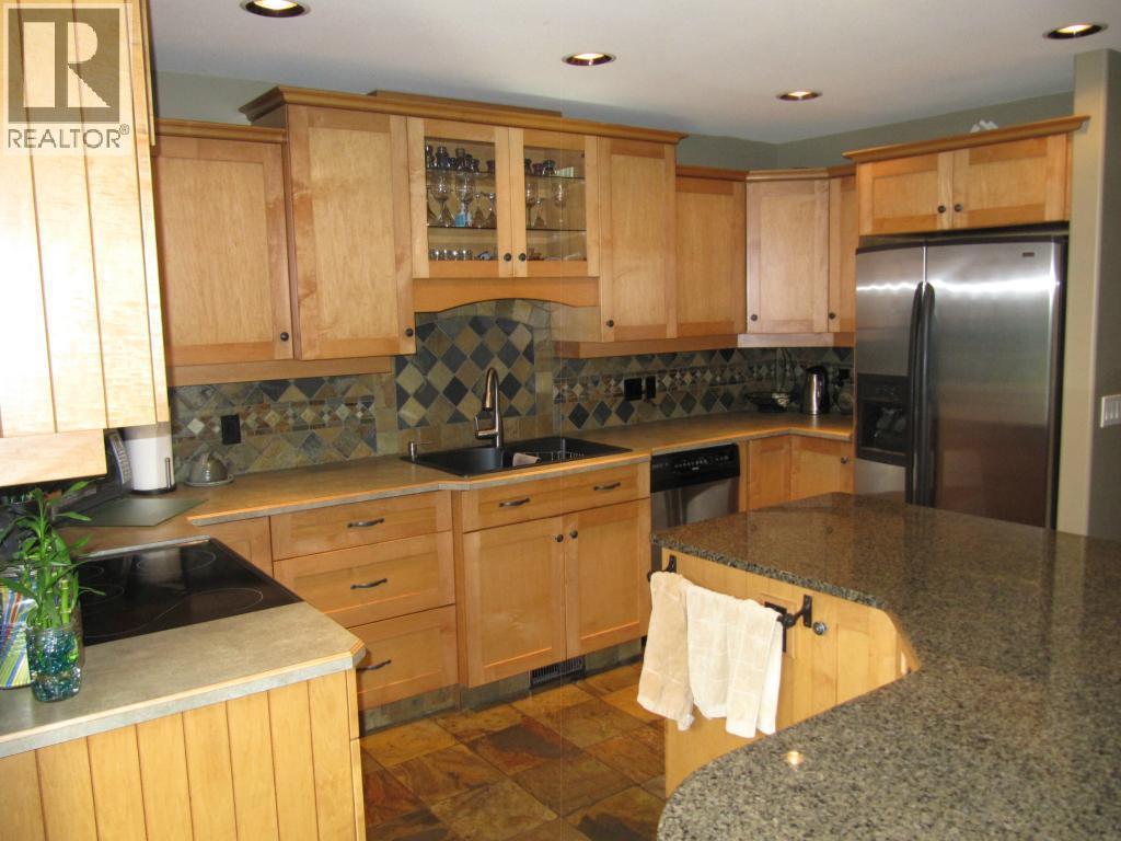 Main Level - 3576 Rose Road, Kelowna, BC - Indoor Photo Showing Kitchen With Double Sink