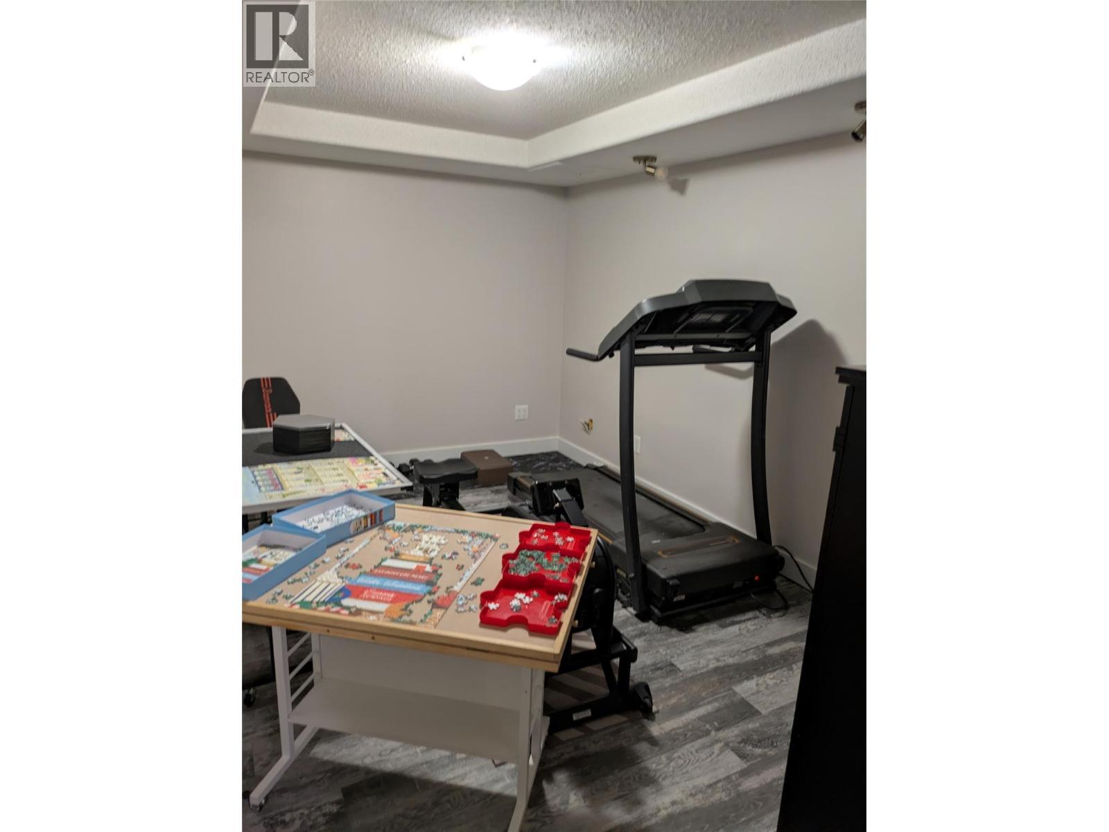 Lower Level - 3576 Rose Road, Kelowna, BC - Indoor Photo Showing Gym Room