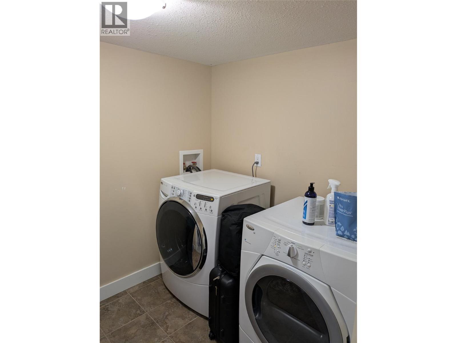 Lower Level - 3576 Rose Road, Kelowna, BC - Indoor Photo Showing Laundry Room