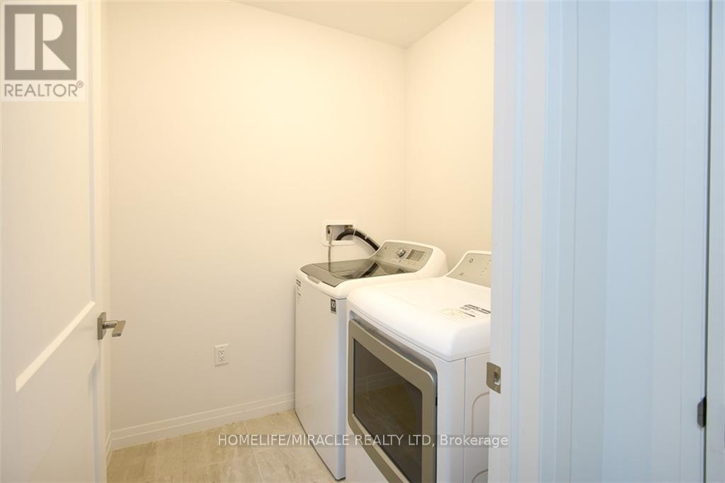 130 - 30 Times Square Boulevard, Hamilton, ON - Indoor Photo Showing Laundry Room
