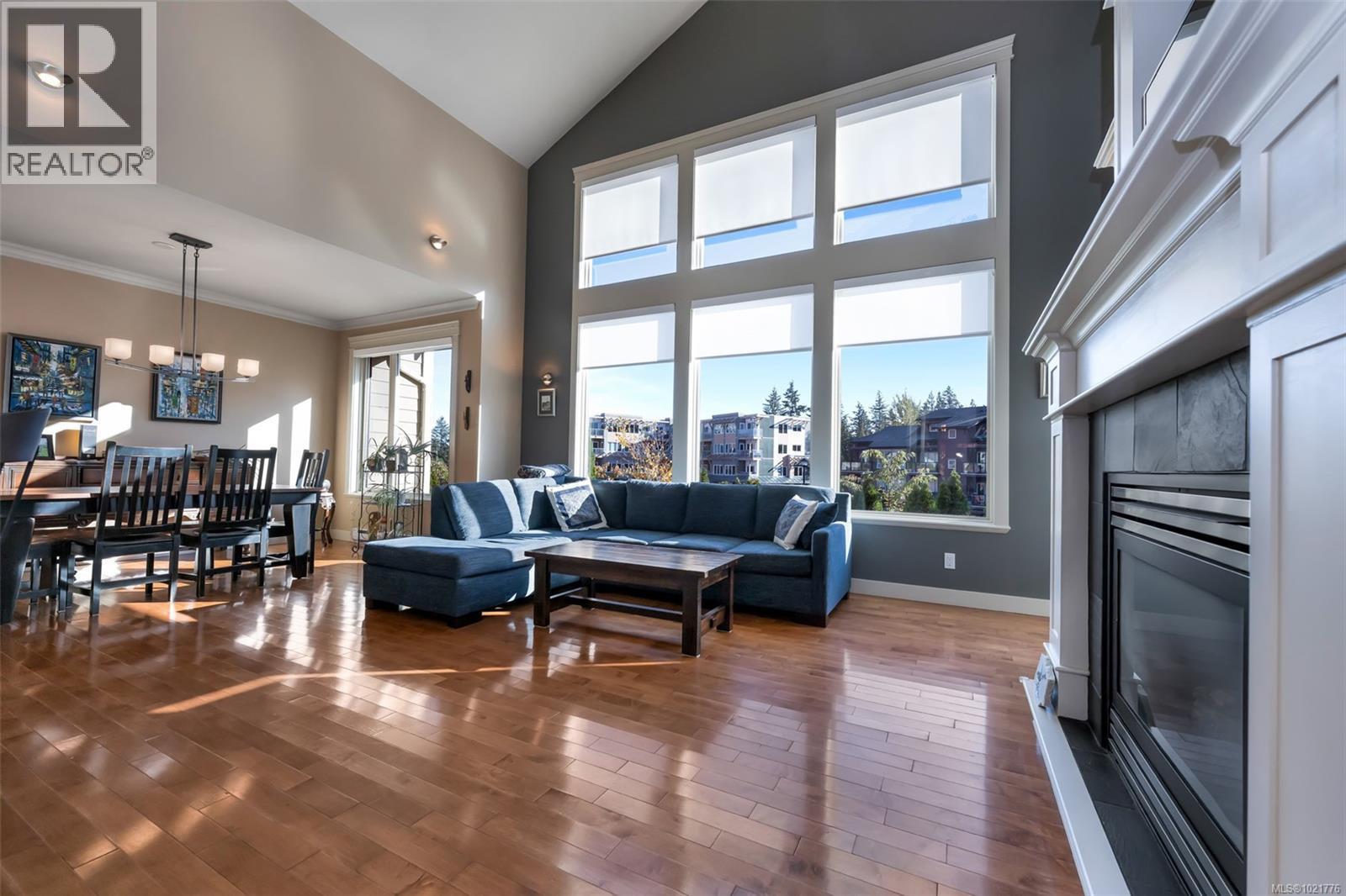 1 630 Brookside Rd, Colwood, BC - Indoor Photo Showing Living Room With Fireplace