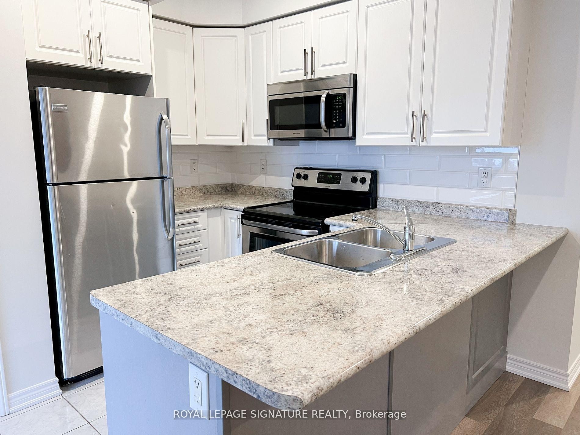 201-2326 Taunton Road, Oakville, ON - Indoor Photo Showing Kitchen With Stainless Steel Kitchen With Double Sink With Upgraded Kitchen
