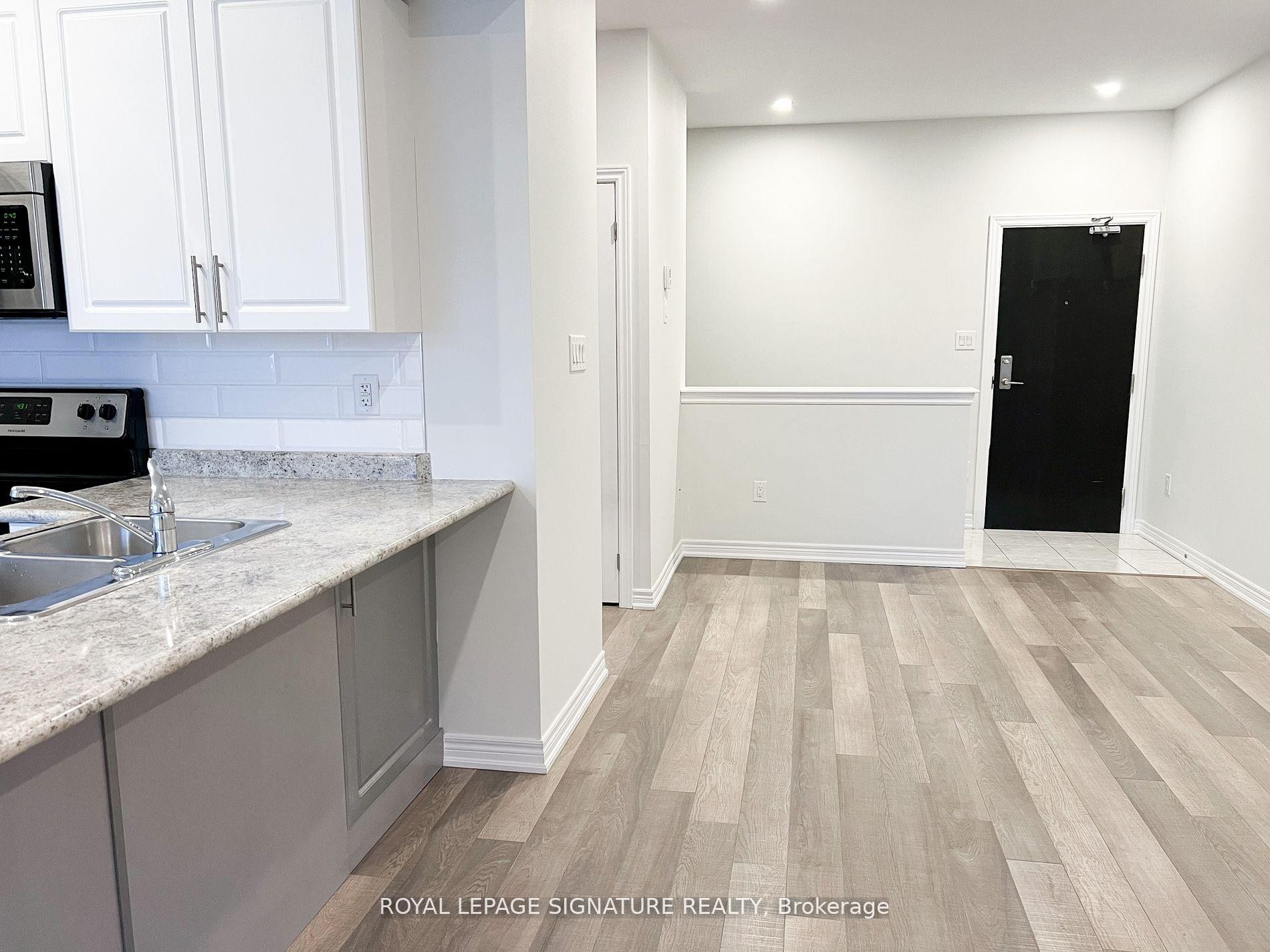 201-2326 Taunton Road, Oakville, ON - Indoor Photo Showing Kitchen With Double Sink
