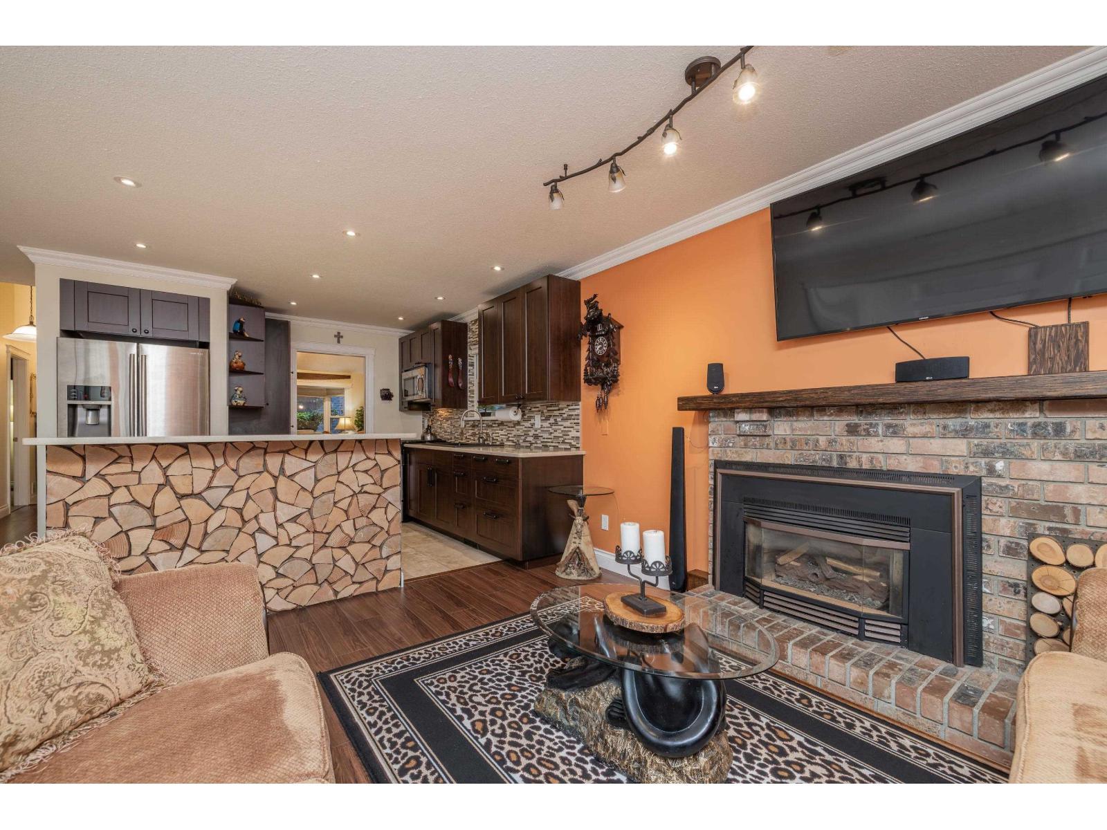 13452 62A Avenue, Surrey, BC - Indoor Photo Showing Living Room With Fireplace
