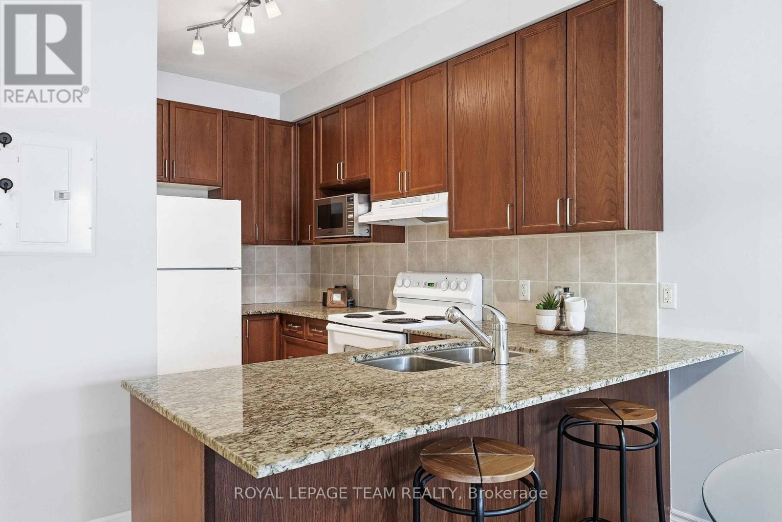 217 - 205 Bolton Street, Ottawa, ON - Indoor Photo Showing Kitchen With Double Sink